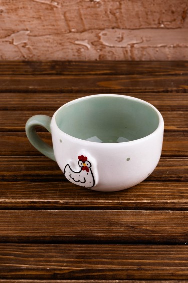 كوب الدجاجة الظريفة