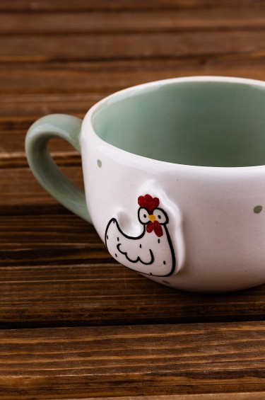 كوب الدجاجة الظريفة