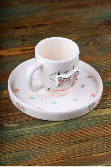 كوب ابرة وخيط