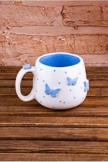 كوب فراشات سماوية