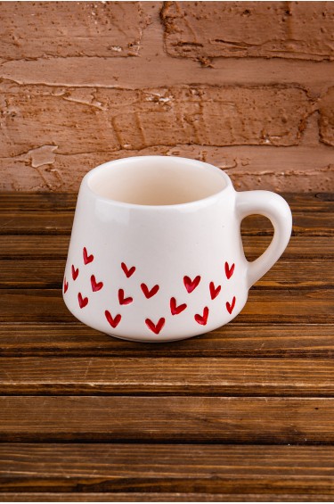 كوب قلوب متدفقة