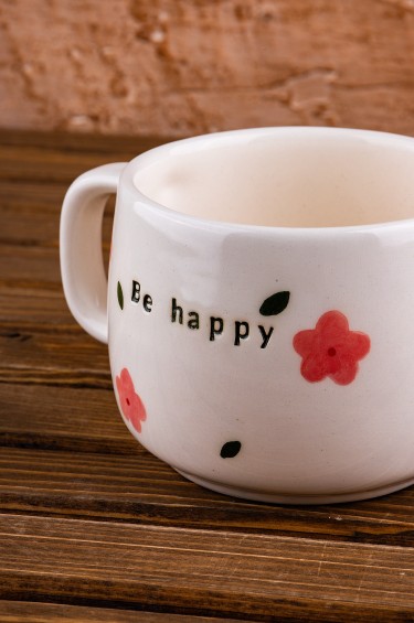 كوب كن سعيدا