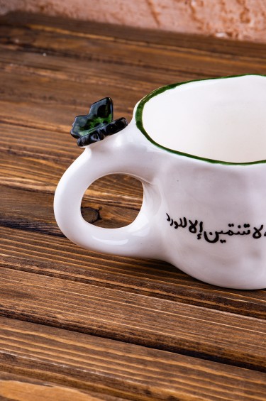 كوب وكأنك فراشة